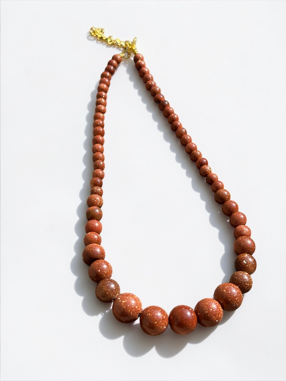 Collar de Piedra Dorada
